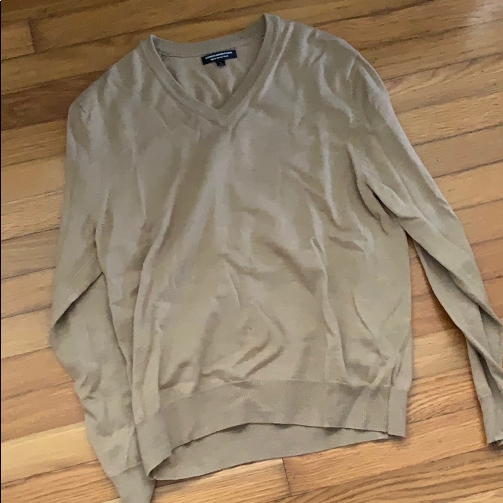 Express extraneous fine merino wool sweater